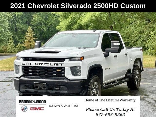 2021 Chevrolet Silverado 2500 HD Custom in Summit White — front three-quarter view