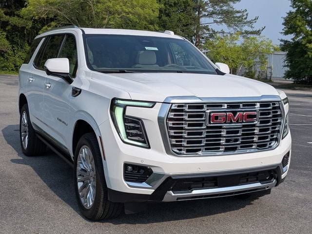 2026 GMC Yukon Denali in Summit White — front three-quarter view