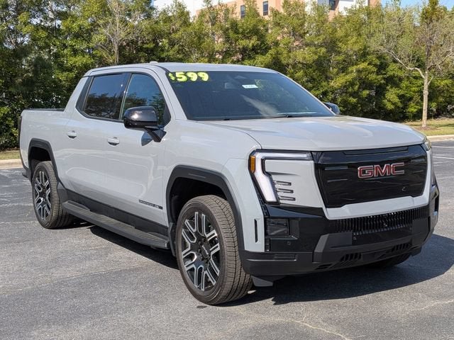 2026 GMC Sierra EV Elevation Standard Range in Thunderstorm Gray — front three-quarter view