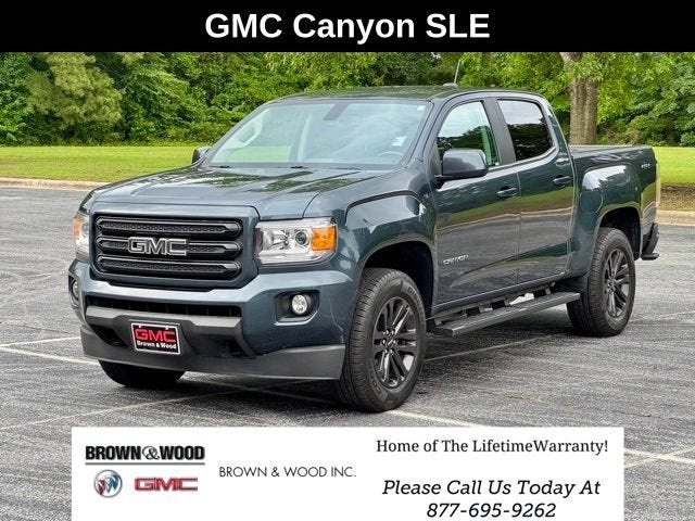 2020 GMC Canyon SLE in Dark Sky Metallic — front three-quarter view