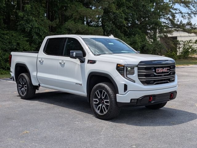 2026 GMC Sierra 1500 AT4 in Summit White — front three-quarter view