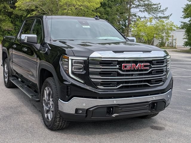 2026 GMC Sierra 1500 SLT in Onyx Black — front three-quarter view