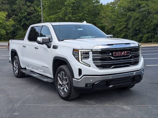 2026 GMC Sierra 1500 SLT in Summit White — front three-quarter view