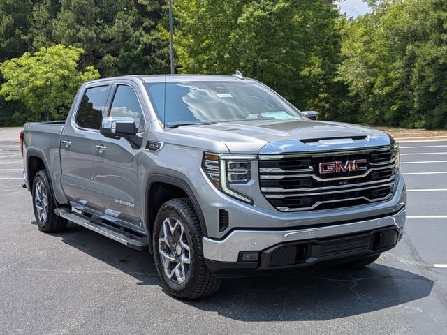 2026 GMC Sierra 1500 SLT in Sterling Metallic — front three-quarter view