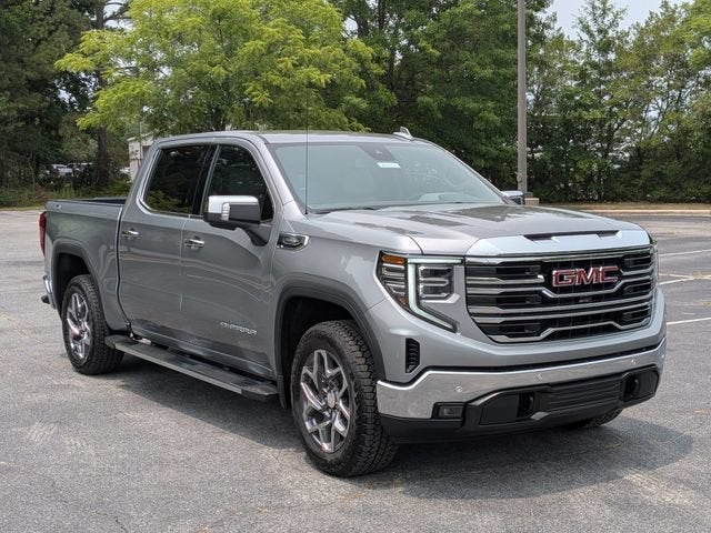 2026 GMC Sierra 1500 SLT in Sterling Metallic — front three-quarter view
