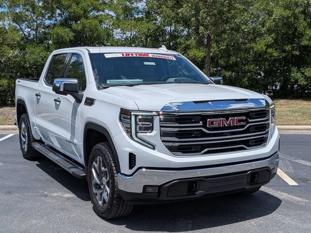 2026 GMC Sierra 1500 SLT in Summit White — front three-quarter view