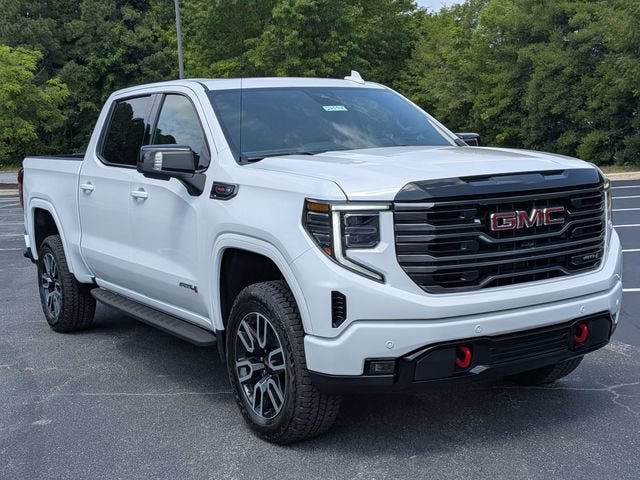 2026 GMC Sierra 1500 AT4 in Summit White — front three-quarter view